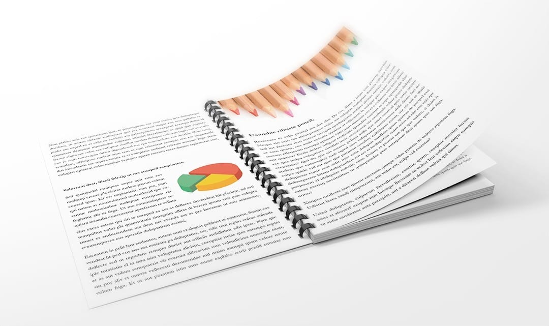 Report with comb binding and pages printed in colour